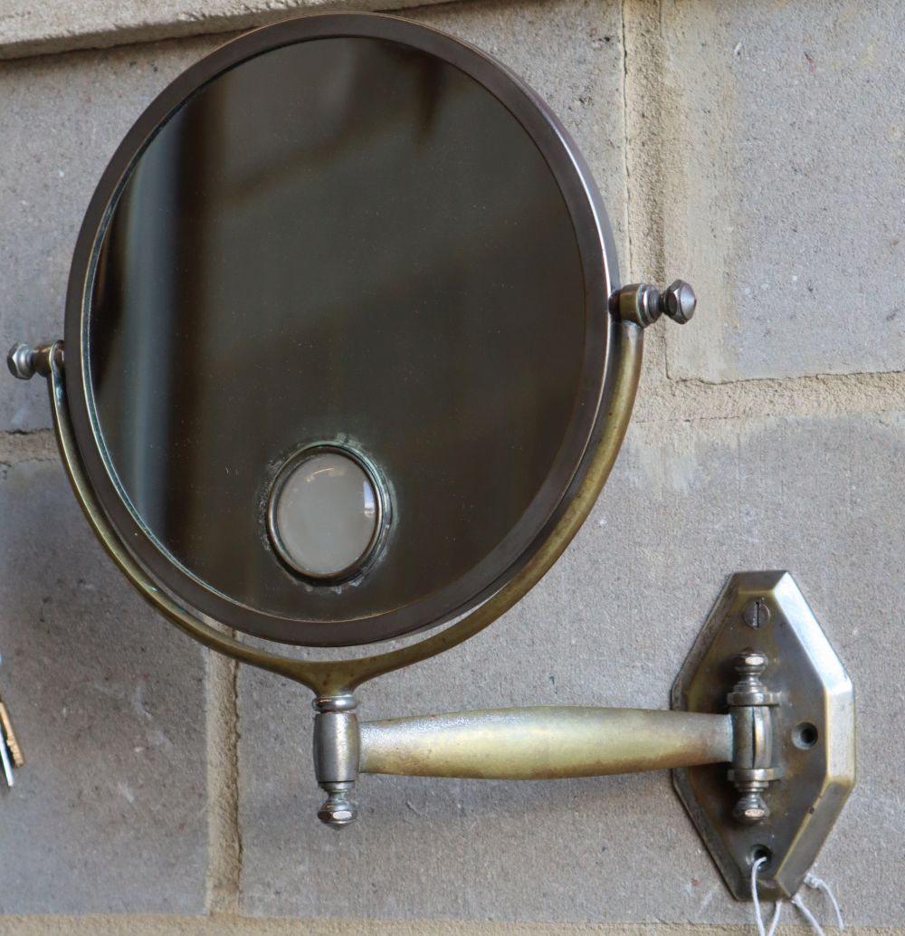 An Art Deco shaving mirror, plate 24cm diameter